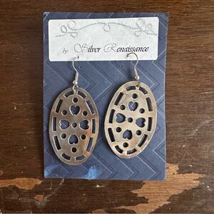 2” Earrings made by my parents from Salvaged metal.